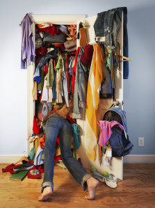 Person stuck in a overstuffed closet.