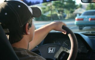 Man Driving a Car