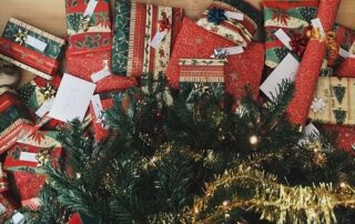 Above view of presents under a tree at Christmas time.