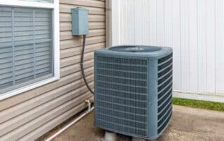 Air condition sitting outside of a home in Boston.