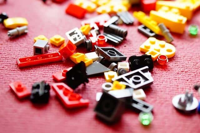 Lego building blocks on the floor.