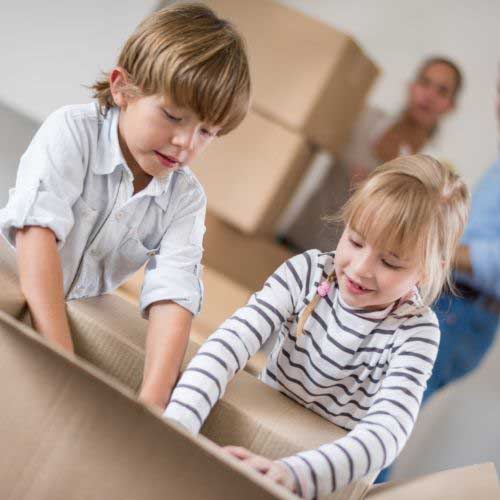 kids with a moving box