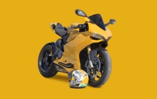 Yellow motorcycle with a yellow background.