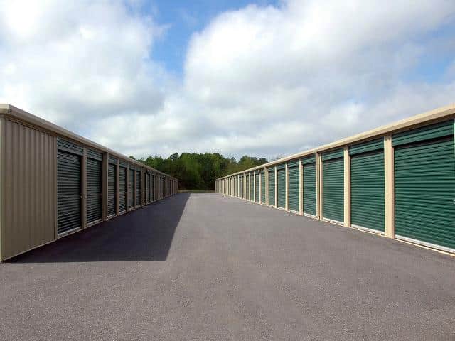 Driveway between two rows of self storage units.