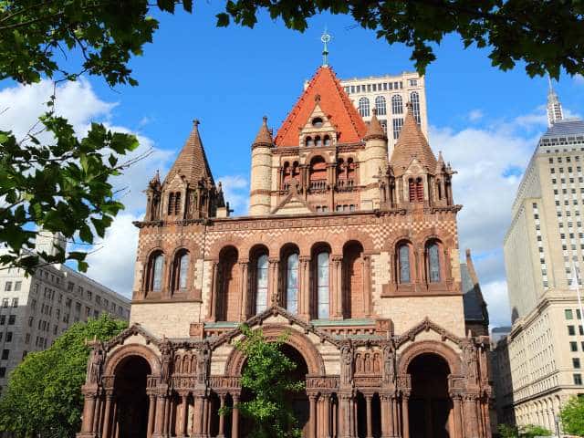 Tall brick building with spires.