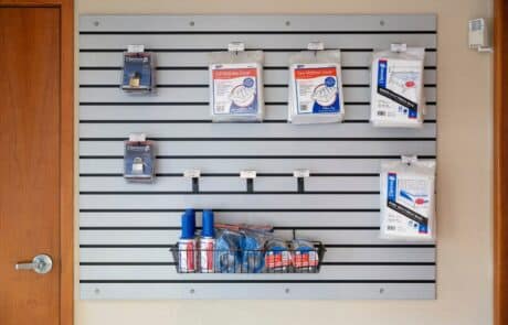 pegboard with various moving and packaging supplies displayed